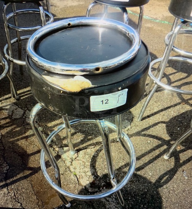 One 2 Ring Chrome Barstool With Black Cushioned Swivel Seat.  - Image 1 of 1