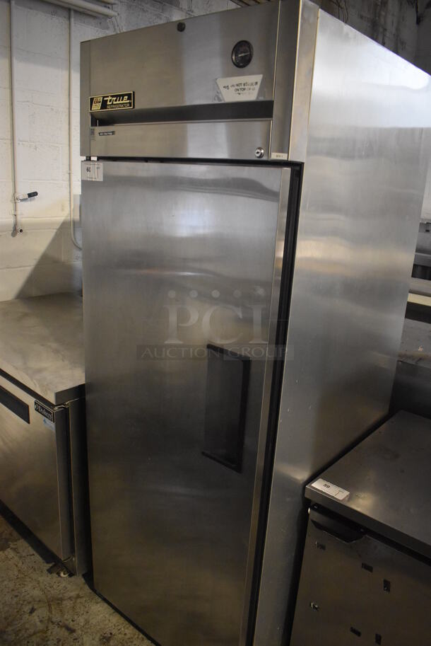 True TG1R-1S ENERGY STAR Stainless Steel Commercial Single Door Reach In Cooler w/ Poly Coated Racks. 115 Volts, 1 Phase. 29x34x82. Tested and Working!