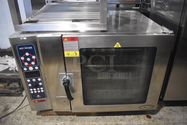 2010 Alto Shaam 7.14 ESG/SK Stainless Steel Commercial Natural Gas Powered Combi Convection Oven w/ Stainless Steel Pan Rack Stand on Commercial Casters. 91,000 BTU. 48x42x35, 36x28x32
