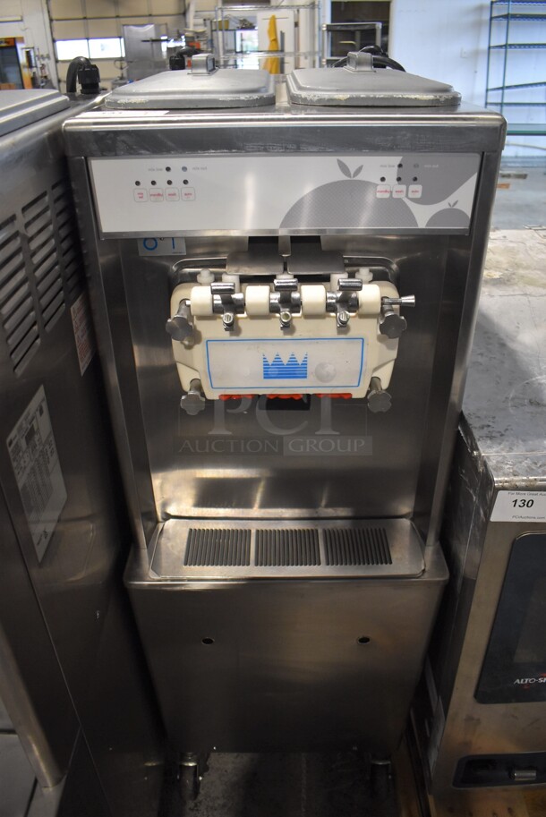 2012 Taylor 794-33 Stainless Steel Commercial Floor Style Air Cooled 2 Flavor w/ Twist Soft Serve Ice Cream Machine on Commercial Casters. 208-230 Volts, 3 Phase. 20x34x60