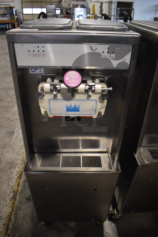 2012 Taylor 794-33 Stainless Steel Commercial Floor Style Air Cooled 2 Flavor w/ Twist Soft Serve Ice Cream Machine on Commercial Casters. 208-230 Volts, 3 Phase. 20x34x60