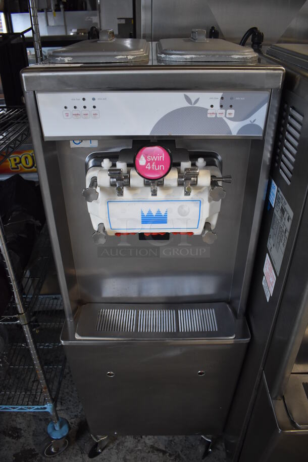 2012 Taylor 794-33 Stainless Steel Commercial Floor Style Air Cooled 2 Flavor w/ Twist Soft Serve Ice Cream Machine on Commercial Casters. 208-230 Volts, 3 Phase. 20x34x60