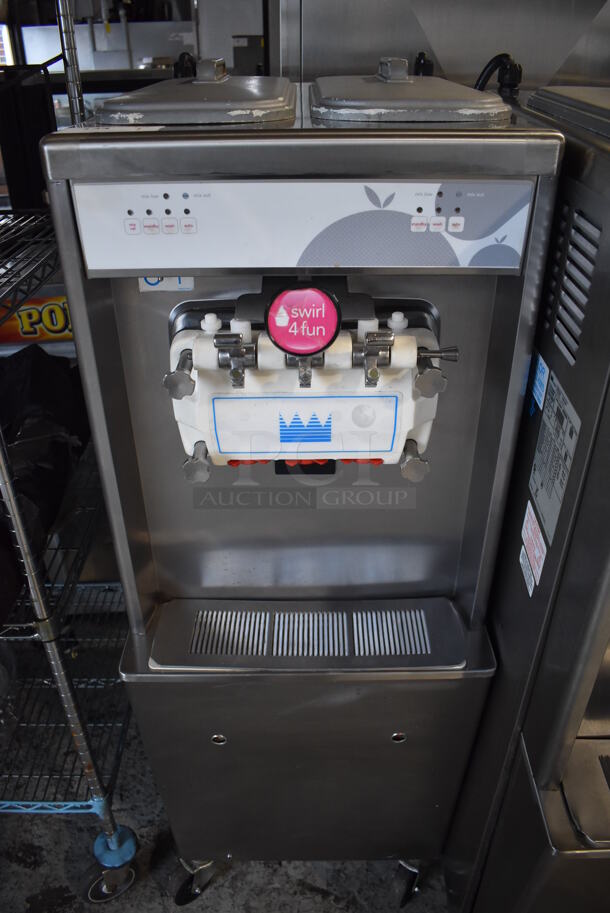 2012 Taylor 794-33 Stainless Steel Commercial Floor Style Air Cooled 2 Flavor w/ Twist Soft Serve Ice Cream Machine on Commercial Casters. 208-230 Volts, 3 Phase. 20x34x60 - Image 1 of 8