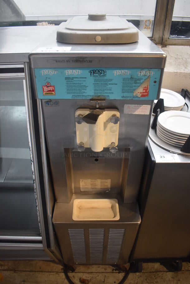 Taylor 358-33 Stainless Steel Commercial Floor Style Single Flavor Soft Serve Ice Cream Machine on Commercial Casters. 208-230 Volts, 3 Phase. 16x32x57