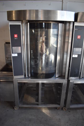 Revent ONE39 EL Stainless Steel Commercial Mini Rotating Rack Oven on Commercial Casters. 440-480 Volts, 3 Phase. 47x50x88