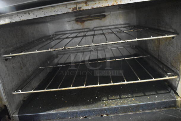 Southbend Select Stainless Steel Commercial Natural Gas Powered 6 Burner Range w/ Flat Top Griddle, Convection Oven, Oven, Over Shelf and Back Splash on Commercial Casters. 61x35x60 - Image 6 of 6