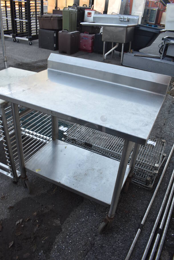 Stainless Steel Table w/ Back Splash and Under Shelf on Commercial Casters. 36x24x39 - Image 2 of 4
