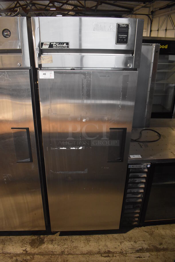 True TG1R-1S Stainless Steel Commercial Single Door Reach In Cooler w/ Poly Coated Racks on Commercial Casters. 115 Volts, 1 Phase. 29x34x82. Tested and Working!