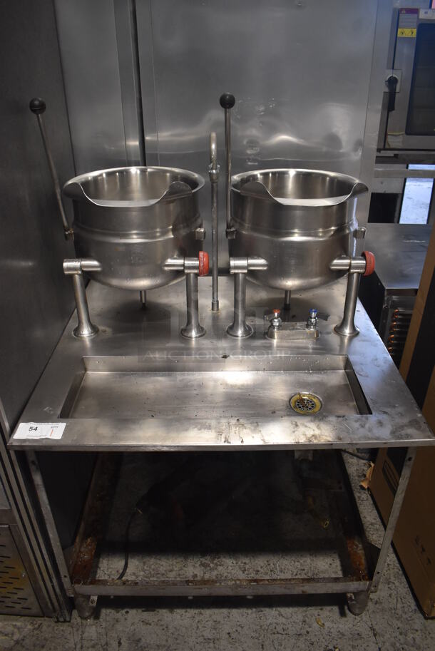 Cleveland Stainless Steel Commercial Pressurized Steam Powered Tilting Kettle Stand w/ 2 Cleveland KDT-6T Tilting Steam Kettles. 35.5x34x55