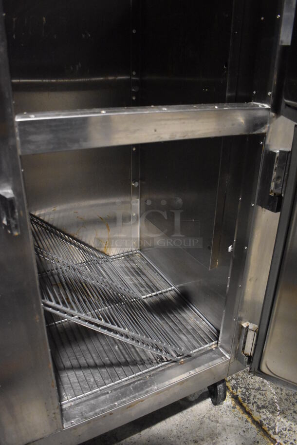 Traulsen RHT232WUT-HHS ENERGY STAR Stainless Steel Commercial 4 Half Size Reach In Cooler on Commercial Casters. 115 Volts, 1 Phase. 58x35x83. Tested and Working! - Image 6 of 7