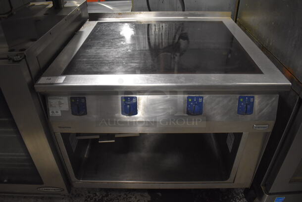 2013 Electrolux 584132 Stainless Steel Commercial Floor Style Electric Powered 4 Burner Range w/ Under Shelf. 208 Volts, 3 Phase. 40x36x38 - Image 1 of 9
