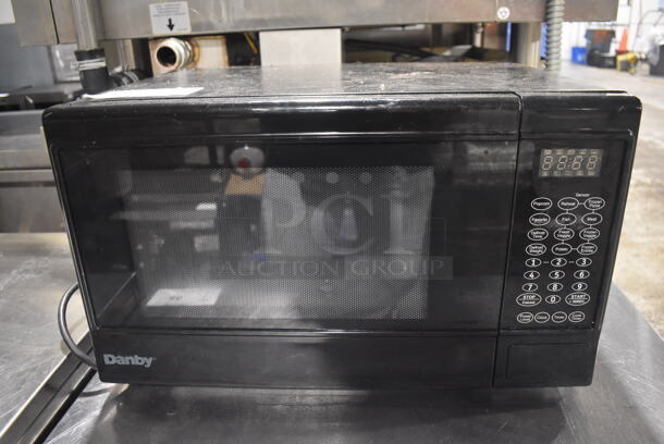 Danby DMW14SA1BDB Metal Countertop Microwave Oven w/ Plate. 120 Volts, 1 Phase. 20x14.5x13