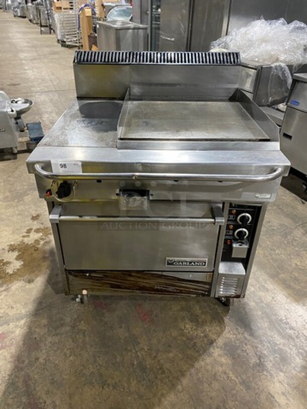 NICE! Garland Commercial Natural Gas Powered Hot Plate With Right Side Flat Griddle! Griddle Has Side Splashes! With Back Splash! With Oven Underneath! All Stainless Steel!