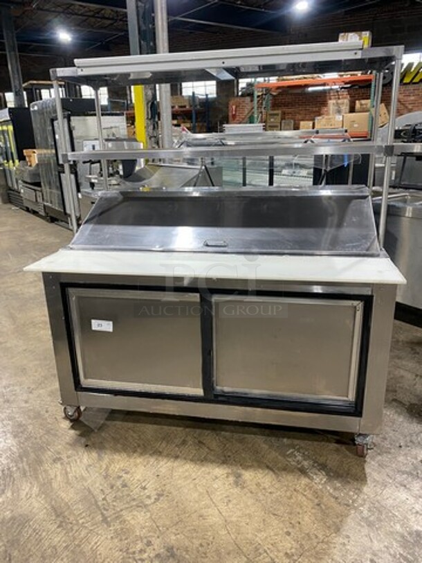 Leader Commercial Refrigerated Sandwich Prep Table! With Commercial Cutting Board! With Overhead Shelves! With 2 Sliding Door Storage Space Underneath! All Stainless Steel! On Casters! Model: LM60R SN: PZ03M3102E 115V 60HZ 1 Phase