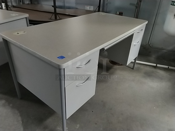 Gray Desk w/ 4 Drawers. 60x30x29.5 (Stickered blue tape #2)