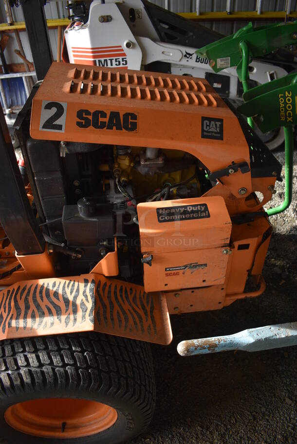 Scag STT61V-28CAT-SS Metal Commercial Diesel Powered Turf Tiger Riding Lawn Mower. Hours Read 849. BUYER MUST REMOVE. 80x90x70. Unit Was In Working Condition During The Last Mowing Season. (HS: Garage 1) - Image 12 of 12