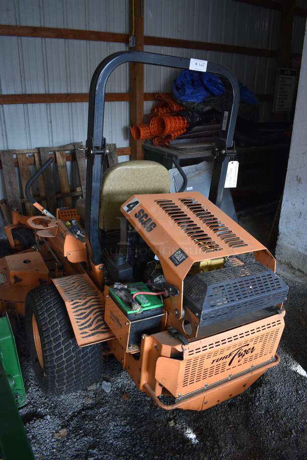 Scag STT-28CAT-SS Metal Commercial Turf Tiger Riding Lawn Mower. Unit Has Had Some Parts Removed. BUYER MUST REMOVE. 84x95x67. (HS: Garage 1) - Image 8 of 10