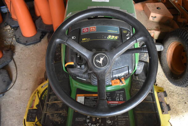 John Deere M00325C095264 325 Metal Commercial 18 HP V Twin Riding Lawn Mower. Comes w/ Key. Hours Read 954. BUYER MUST REMOVE. 52x68x41. (HS: Garage 2) - Image 7 of 12