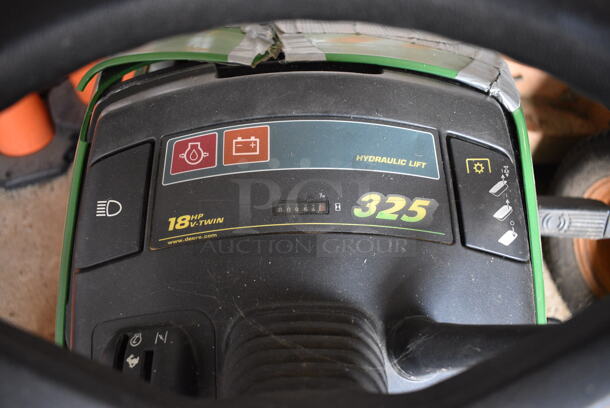 John Deere M00325C095264 325 Metal Commercial 18 HP V Twin Riding Lawn Mower. Comes w/ Key. Hours Read 954. BUYER MUST REMOVE. 52x68x41. (HS: Garage 2) - Image 10 of 12