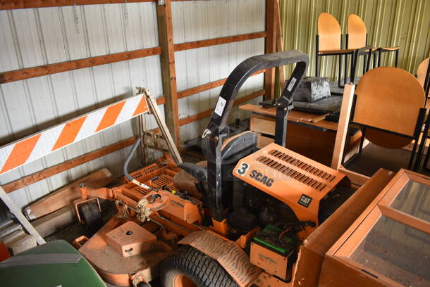 Scag STT-28CAT-SS Metal Commercial Turf Tiger Riding Lawn Mower. Hours Read 1549. BUYER MUST REMOVE. 72x95x68. Unit Is Hard To Start and Shuts Off While Mowing. (HS: Garage 2) - Image 2 of 12