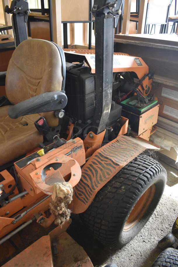 Scag STT-28CAT-SS Metal Commercial Turf Tiger Riding Lawn Mower. Hours Read 1549. BUYER MUST REMOVE. 72x95x68. Unit Is Hard To Start and Shuts Off While Mowing. (HS: Garage 2) - Image 6 of 12