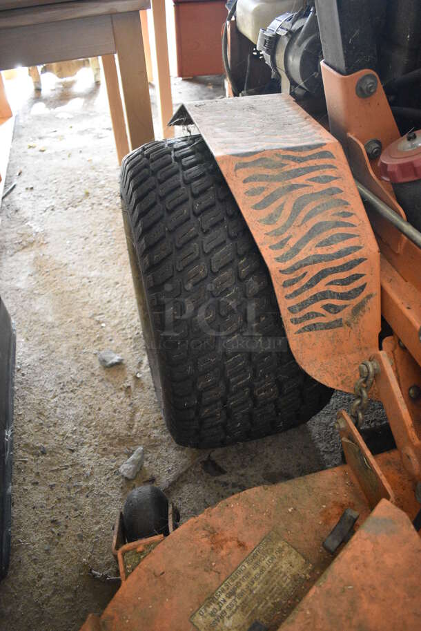 Scag STT-28CAT-SS Metal Commercial Turf Tiger Riding Lawn Mower. Hours Read 1549. BUYER MUST REMOVE. 72x95x68. Unit Is Hard To Start and Shuts Off While Mowing. (HS: Garage 2) - Image 8 of 12