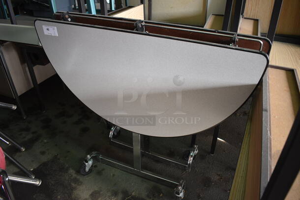 Gray Folding Portable Round Table on Commercial Casters. 47x18x40. (HS: Garage 4) - Image 2 of 4