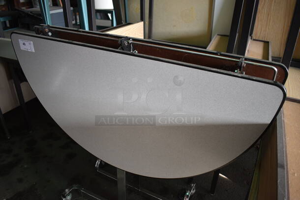 Gray Folding Portable Round Table on Commercial Casters. 47x18x40. (HS: Garage 4) - Image 3 of 4