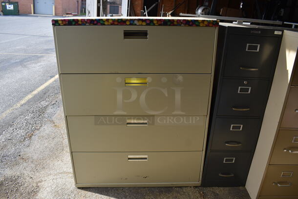 Tan Metal 4 Drawer Filing Cabinet. 42x19.5x53. (HS: Garage 5) - Image 1 of 8