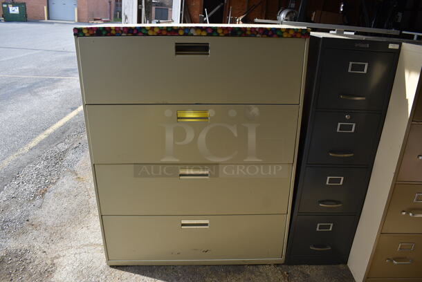 Tan Metal 4 Drawer Filing Cabinet. 42x19.5x53. (HS: Garage 5)