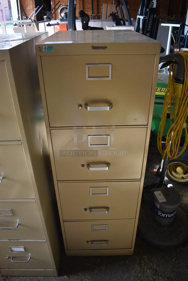Statesman Tan Metal 4 Drawer Filing Cabinet. 18x26x53. (HS: Garage 5)
