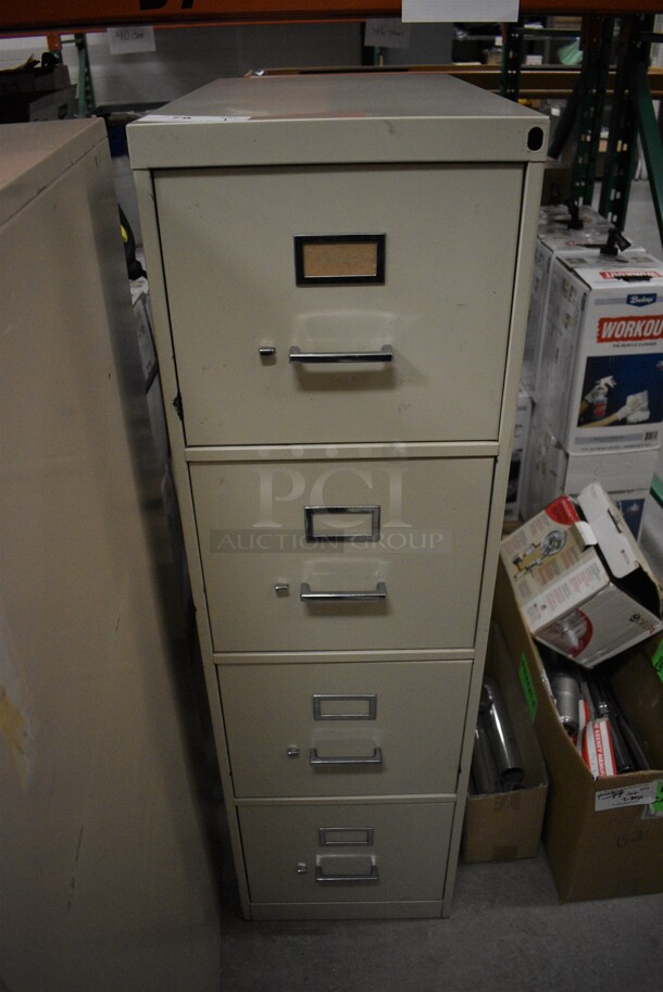 Tan Metal 4 Drawer Filing Cabinet. 15x26.5x52.5. (HS: Backroom)