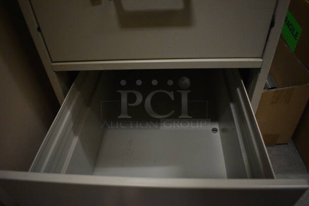 Tan Metal 4 Drawer Filing Cabinet. 15x26.5x52.5. (HS: Backroom) - Image 4 of 7