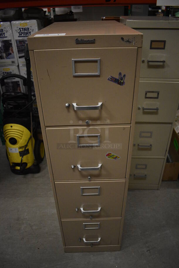 Goldencrest Tan Metal 4 Drawer Filing Cabinet. 15x28.5x52.5. (HS: Backroom)