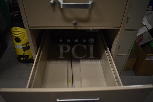 Goldencrest Tan Metal 4 Drawer Filing Cabinet. 15x28.5x52.5. (HS: Backroom) - Image 6 of 8