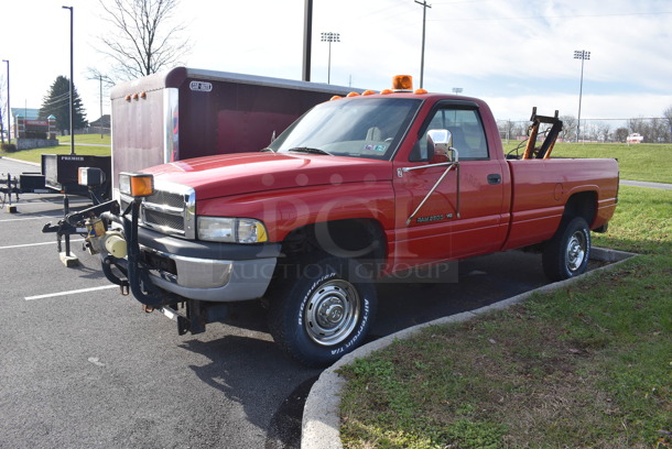 Dodge Ram 2500 V8 Magnum 2 Door Pick Up Truck w/ Lift Gate, Meyer Snow Plow and Meyer Snow Plow Mount. VIN 3B7KF26Z0XM589891. Odometer Reads 72,985. Inspection Is Not Up To Date. Vehicle Has Not Been Used for About Two Years; Has an Undiagnosed Short That Drained Power From the Battery. Unit Will Need To Be Towed Away. Title In Hand. See Lot 2 For Additional Pictures!