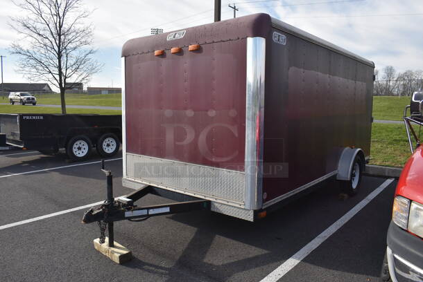 Car Mate Enclosed Trailer w/ Bottom Hinge Back Door / Ramp and Side Door. VIN 5A3C714S94L006840. Unit Is Not Licensed or Inspected; It Has Been Used as Storage for the Past Five Years. Title In Hand. 7'x14'x8'. See Lot 4 For Additional Pictures