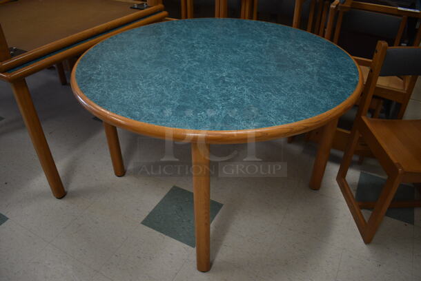 3 Wooden Round Library Table w/ Blue Tabletop. 48x48x29.5. 3 Times Your Bid! (MS: 115 Classroom)