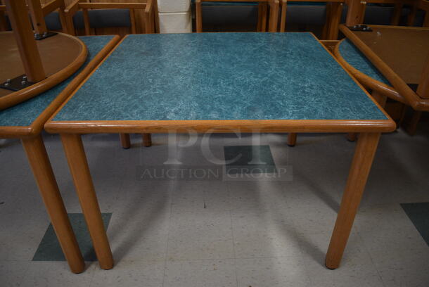 3 Wooden Library Table w/ Blue Tabletop. 42x42x29.5. 3 Times Your Bid! (MS: 115 Classroom)