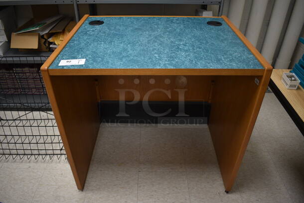 Wooden Desk w/ Blue Desktop. 35.5x29x32.5. (MS: Downstairs 005)