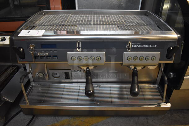 Nuova Simonelli Stainless Steel Commercial Countertop 2 Group Espresso Machine w/ 2 Portafilters and 2 Steam Wands. 208 Volts, 1 Phase. 29x20x21