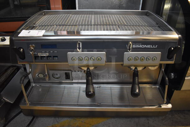 Nuova Simonelli Stainless Steel Commercial Countertop 2 Group Espresso Machine w/ 2 Portafilters and 2 Steam Wands. 208 Volts, 1 Phase. 29x20x21 - Image 1 of 6