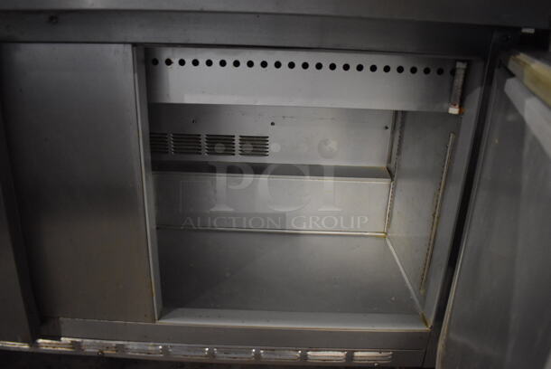 Beverage Air SP60-24M Stainless Steel Commercial Sandwich Salad Prep Table Bain Marie Mega Top on Commercial Casters. 115 Volts, 1 Phase. 60x37x47. Tested and Powers On But Does Not Get Cold - Image 6 of 8