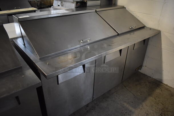 2012 True TSSU-72-30M-B-ST Stainless Steel Commercial Sandwich Salad Prep Table Bain Marie Mega Top on Commercial Casters. 115 Volts, 1 Phase. 72x34x45. Tested and Powers On But Does Not Get Cold