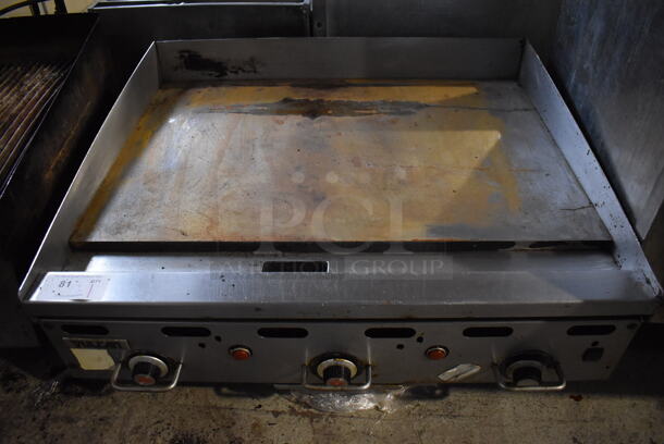 Vulcan Stainless Steel Commercial Countertop Natural Gas Powered Flat Top Griddle w/ Thermostatic Controls. 36x32x16