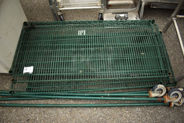 ALL ONE MONEY! Lot of 7 Green Finish Wire Shelves and 4 Poles on Commercial Casters. 54x24x1.5 - Image 1 of 3