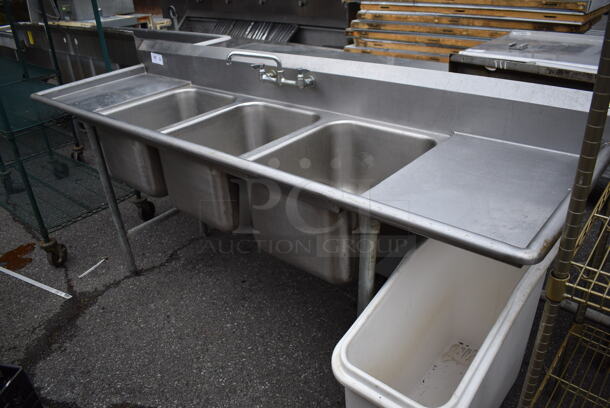 Stainless Steel Commercial 3 Bay Sink w/ Faucet, Handles and Dual Drain Boards. 90x27x44. Bays 16x20x12. Drain Boards 16x23x1
