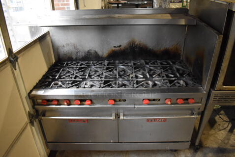 Vulcan Stainless Steel Commercial Natural Gas Powered 10 Burner Range w/ 2 Ovens, Over Shelf, Back Splash and Right Side Guard on Commercial Casters. 62x30x60