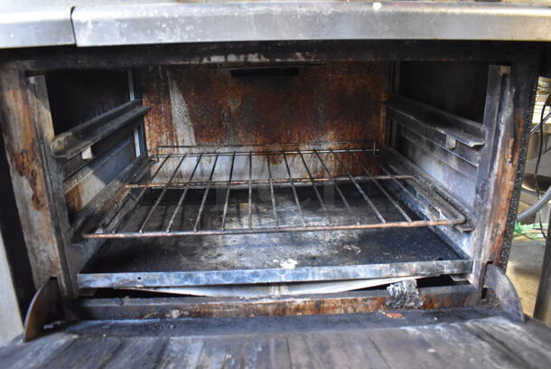 Vulcan Stainless Steel Commercial Natural Gas Powered 10 Burner Range w/ 2 Ovens, Over Shelf, Back Splash and Right Side Guard on Commercial Casters. 62x30x60 - Image 7 of 8