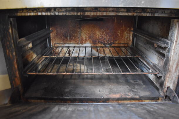 Vulcan Stainless Steel Commercial Natural Gas Powered 10 Burner Range w/ 2 Ovens, Over Shelf, Back Splash and Right Side Guard on Commercial Casters. 62x30x60 - Image 8 of 8